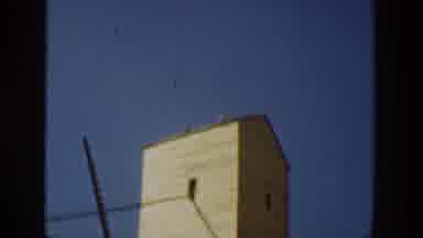 California USA (1936): A Tower Of An Abandoned Factory Is Seeing By Two Men On The