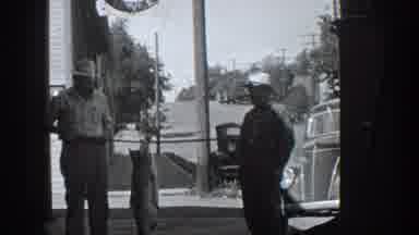 California USA (1936): Two Men Showing A Fish They Caught