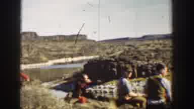 California USA (1936): 3 Men Sitting On A Waterfront Shooting At Something