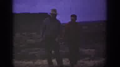 California USA (1936): Men Take Nature Hike Through Hilly Plain In Broad Daylight