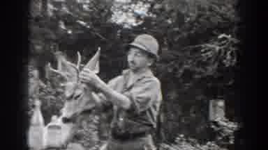 Chelan Washington USA (1939): Hunter Playing With Dead Deer Hitting Another Hunter