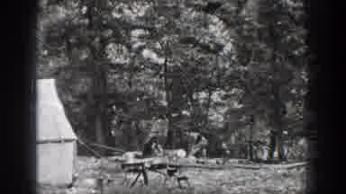 Chelan Washington USA (1939): Men Saw Lumber At Campsite Man Walks In Wooded Area
