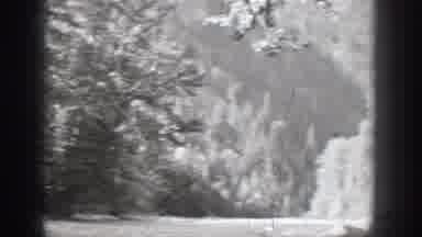 Chelan Washington USA (1939): Man Fishes Standing In Boat On Calm Waters In