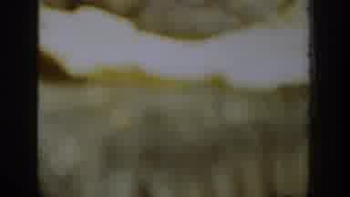 Chelan Washington USA (1939): A Man In A Red Hat Sitting In A Field Then Drinking