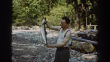 Chelan Washington USA (1939): Man Presents Beautiful Fish Caught On A Hard Day Two