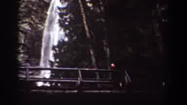 Chelan Washington USA (1939): A Park With A Bridge And A Waterfall With Crystal