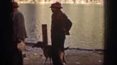 Chelan Washington USA (1939): Four Men With A Dog Working Near A Pier With A Boat