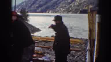 Chelan Washington USA (1939): A Group Of Men Drink And Load Camping Supplies