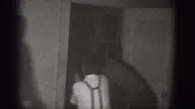 Chelan Washington USA (1939): Two Men Dragging Person Through Door And Pinching