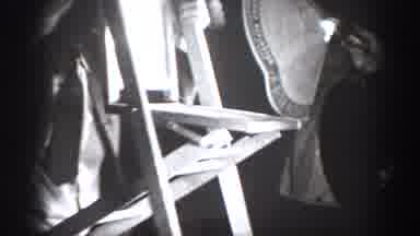 Chelan Washington USA (1939): Three Men Play Fight With One Holding Up A Chair To