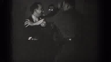 Chelan Washington USA (1939): The Two Mans Are Doing Fight On The Outside Of Road