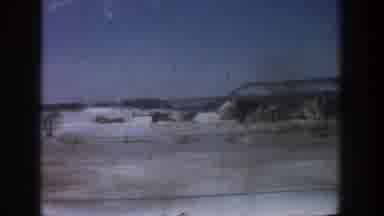 Aspen Colorado USA (1961): Car Driving Fast Across Snowy Landscape Nice View