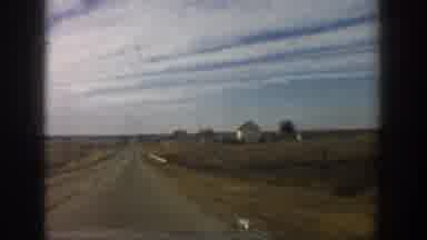 Aspen Colorado USA (1961): Passing Views Of White Farm Houses On Country Road In