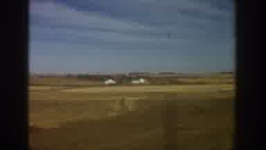 Aspen Colorado USA (1961): Traveling Through Open Plains Houses In The Distance