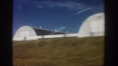 Aspen Colorado USA (1961): A Panoramic View Of Green Houses And Rows Of Silos In