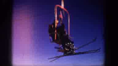 Aspen Colorado USA (1961): People Skiing Down A Hill And Riding A Ski Lift
