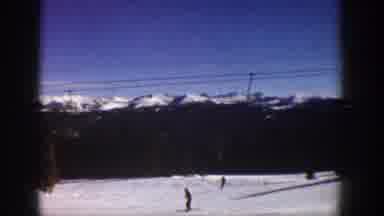 Aspen Colorado USA (1961): People Skiing And A Station Wagon Driving Down The Road