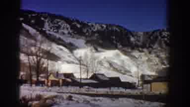 Aspen Colorado USA (1961): Small Group Of Houses With Snowy Mountains In The