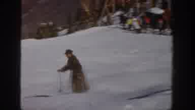 Aspen Colorado USA (1961): Guy On Skiers Doing 360 Degree Spins On A Snow Court