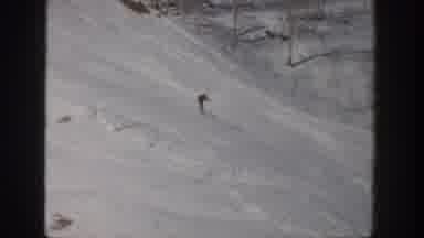 Aspen Colorado USA (1961): Person Skiing Down A Mountain While Zigzagging