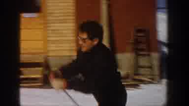 Aspen Colorado USA (1961): Man Wearing Black Shirt Takes Off On Skis On A Sunny