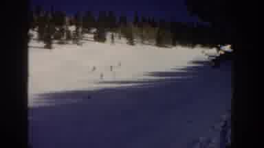 Aspen Colorado USA (1961): Four Skiers Descend A Snowy Slope, In Line, While