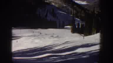 Aspen Colorado USA (1961): Distant And Medium Distance View Of People Skiing On