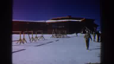 Aspen Colorado USA (1961): Ski Resort With Empty Ski Racks And First Few Skiers