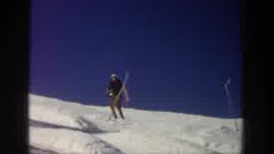 Aspen Colorado USA (1961): Person Enthusiastically Skiing Down Snow-Covered Slope