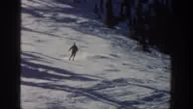 Aspen Colorado USA (1961): Person In Winter Gear Skiing Down Snowy Hill Quickly
