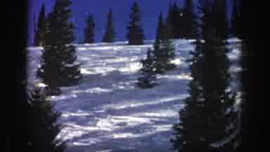 Aspen Colorado USA (1961): Man Rapidly Skiing Downhill Through Snow Powder On A