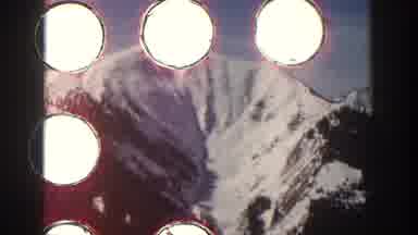 Aspen Colorado USA (1961): People Walking Up A Mountain Getting Ready To Ski Down
