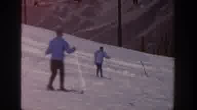 Aspen Colorado USA (1961): Family Skiing Down A Mountain