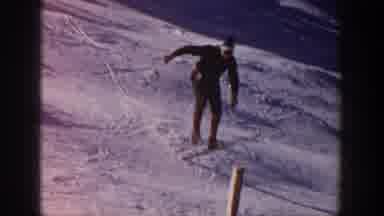 Aspen Colorado USA (1961): Man Jumping Over Ski On A Sloping Hill With Snow