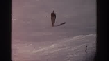 Aspen Colorado USA (1961): One Person Skiing Down A Ski Slope Alone In The Snow