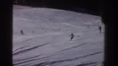 Aspen Colorado USA (1961): Some People Skiing Down Hill On White Snow Old Video