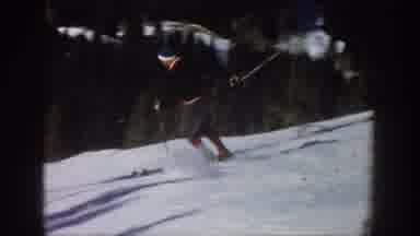 Aspen Colorado USA (1961): Solo Male Skiing Down Snowy White Hill Near Heavily