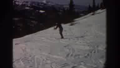Aspen Colorado USA (1961): Person Skiing Down Steep Snowy Mountain Crossing Trails