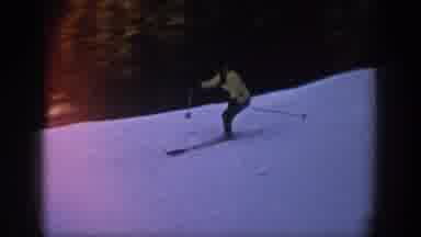 Aspen Colorado USA (1961): Snow Skier Races Downhill Weaving Back And Forth