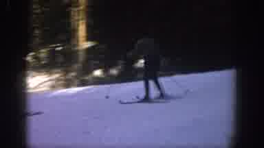 Aspen Colorado USA (1961): Men Skiing In The Snow In The Winter And Going Down A