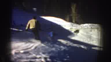Aspen Colorado USA (1961): Several People Skiing Downhill On A Bright Sunny Winter