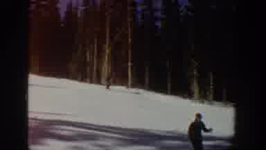 Aspen Colorado USA (1961): Person Filming Others Ski Down A Bunny Hill Avoiding