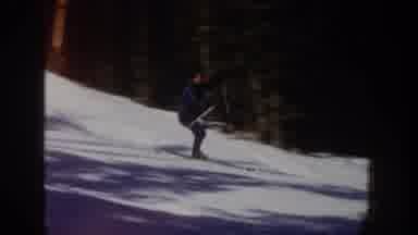 Aspen Colorado USA (1961): A Man Skiing Down Hill On Snow During A Winter Day