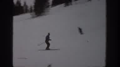 Aspen Colorado USA (1961): Man Skiing Down White Snowy Mountain Slope On Skis Cold