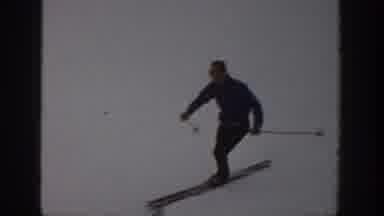 Aspen Colorado USA (1961): A Man Is Skating In The Snow Floor And Enjoying The