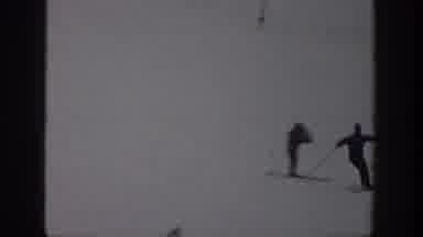 Aspen Colorado USA (1961): People On A Snowy Ski Slope, Some Are Skiing Downhill