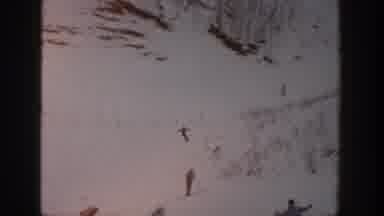 Aspen Colorado USA (1961): Fun Day Of A Bunch Of Skiers Enjoying Sliding On The