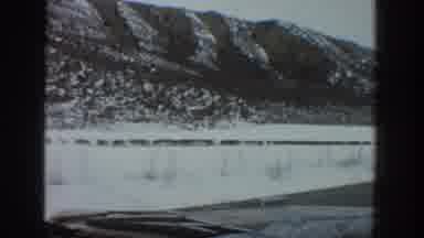 Aspen Colorado USA (1961): Car Driving On A Road On Besides Mountains Covered With