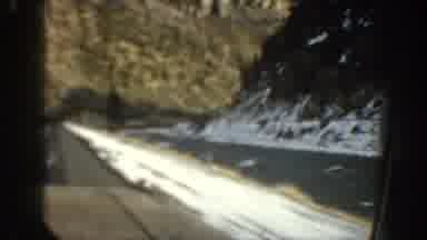 Aspen Colorado USA (1961): A Highway Surrounded By Mountains With Snow On The