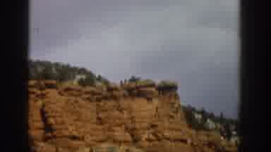 Aspen Colorado USA (1961): Wild Stratified Mountains With Trees On Top And An